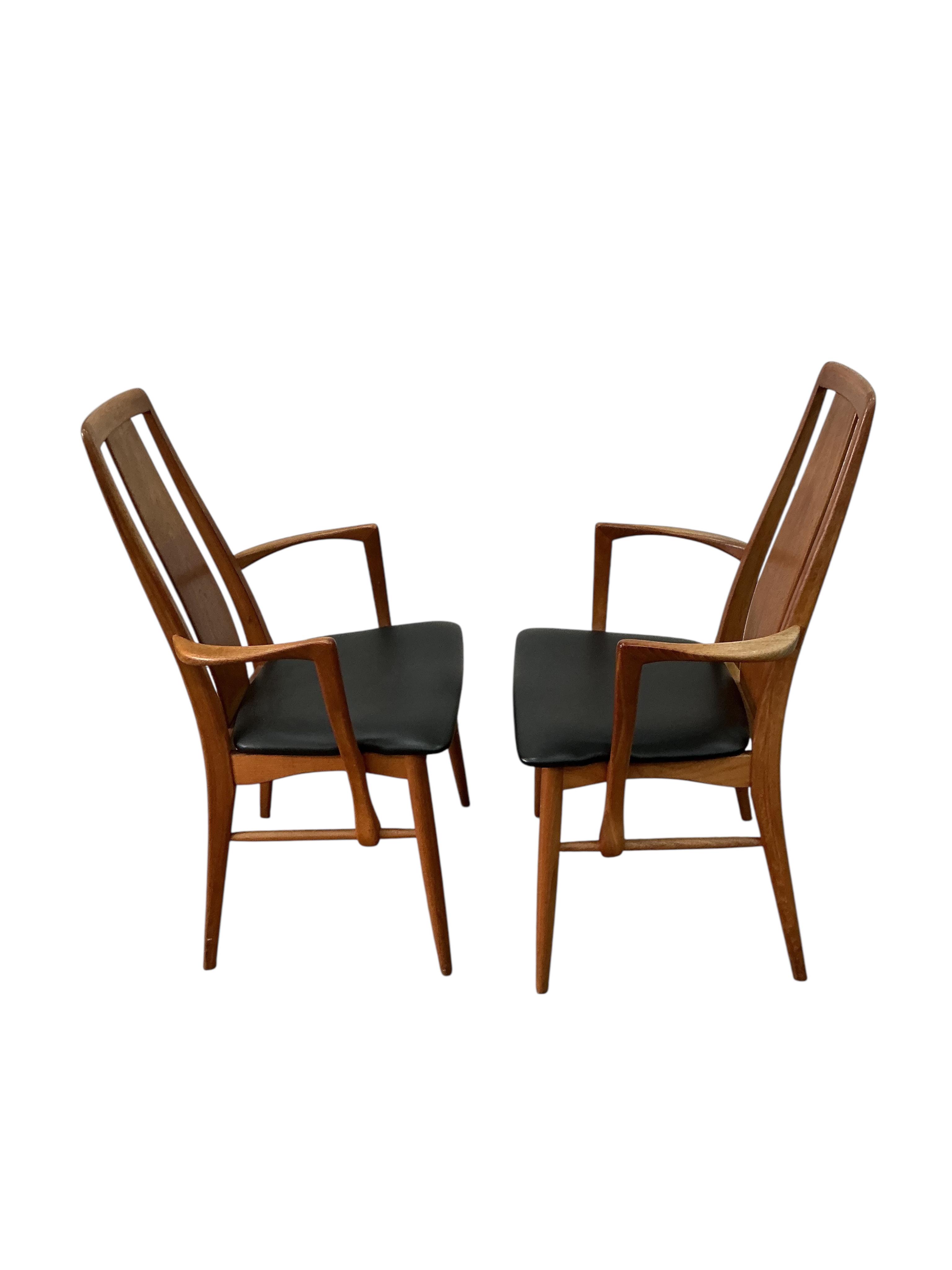 A Danish mid century dining table by Koefoeds-Hornslet, width 250cm extended, two spare leaves, depth 104cm, height 71cm, together with six chairs, two with arms